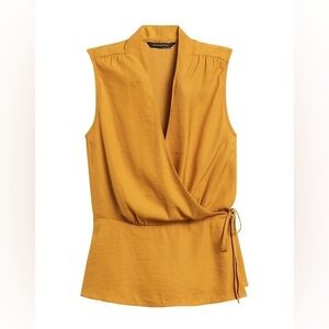 BANANA REPUBLIC soft mustard yellow wrap shirt, feminine peplum style.